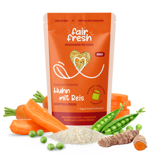 Huhn mit Reis, Karotten und Erbsen